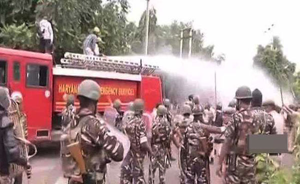police-fire-water-cannons-after-ram-rahim-verdict.jpg